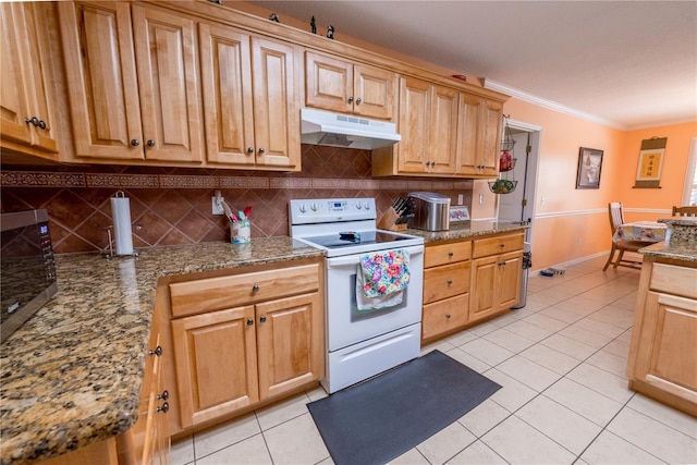 kitchen featuring light tile patterned floors, ornamental molding, decorative backsplash, dark stone countertops, and white range with electric cooktop