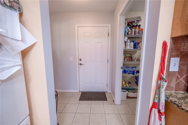 view of tiled entryway