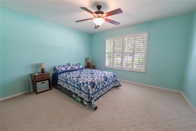 bedroom featuring ceiling fan and carpet floors