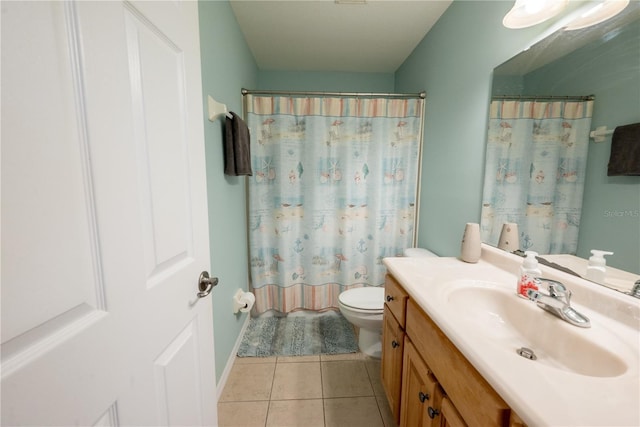 bathroom with curtained shower, vanity, toilet, and tile patterned floors