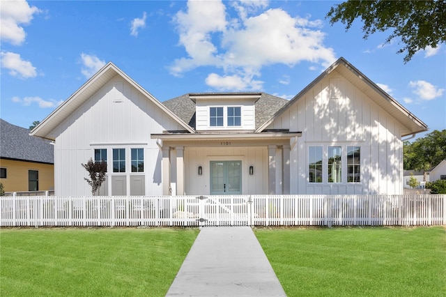 1101 SW 136th St, Newberry, FL 32669 - view of front of house with a porch, a front yard, and a fenced front yard