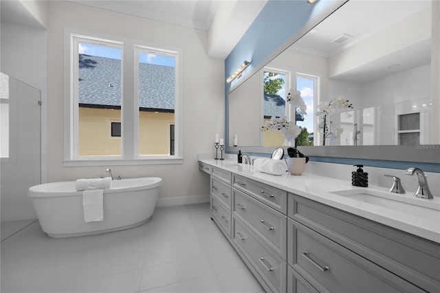 1101 SW 136th St, Newberry, FL 32669 - full bathroom with baseboards, a sink, double vanity, and tiled shower