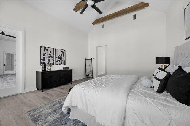 1101 SW 136th St, Newberry, FL 32669 - bedroom featuring high vaulted ceiling, wood finished floors, beamed ceiling, baseboards, and visible vents