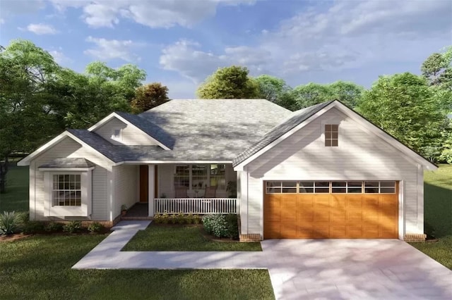 view of front of house featuring a front yard, a porch, and a garage