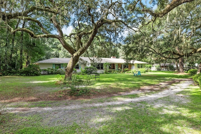 view of front of house with a front lawn