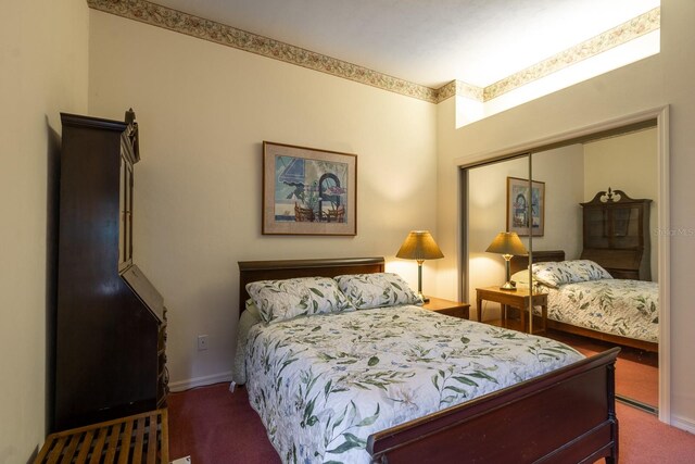 carpeted bedroom with a closet