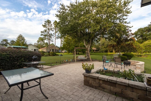 view of patio / terrace with a fire pit