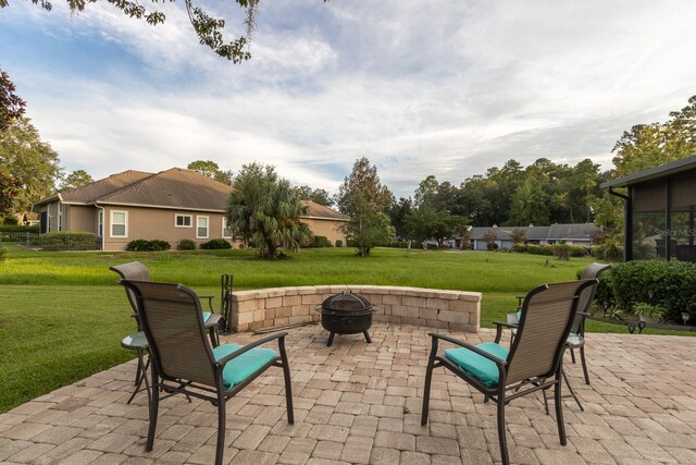 view of patio / terrace featuring a fire pit