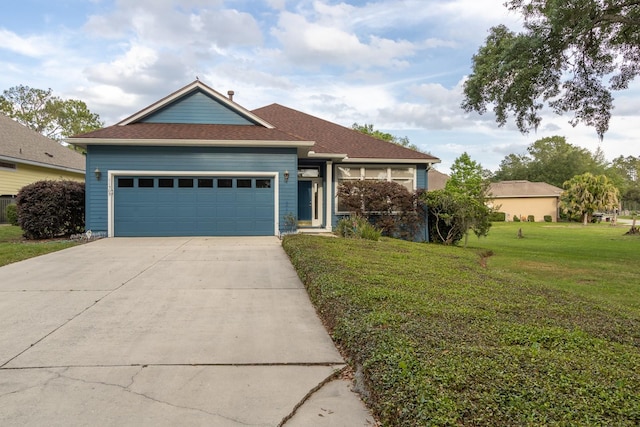 11509 NW 67th Ter, Alachua, FL 32615 - ranch-style house featuring roof with shingles, central AC unit, driveway, an attached garage, and a front yard