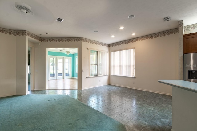 11509 NW 67th Ter, Alachua, FL 32615 - interior space with a ceiling fan, visible vents, and a wealth of natural light