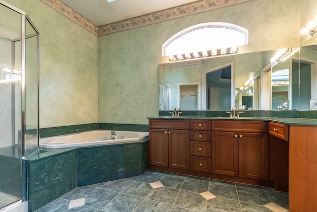 11509 NW 67th Ter, Alachua, FL 32615 - bathroom featuring a garden tub, a sink, double vanity, and a shower stall