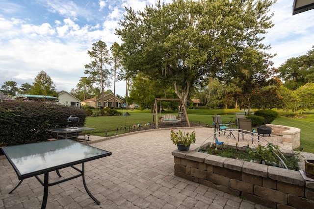 11509 NW 67th Ter, Alachua, FL 32615 - view of patio / terrace featuring a fire pit