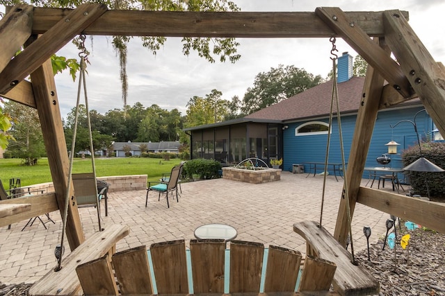 11509 NW 67th Ter, Alachua, FL 32615 - view of patio / terrace featuring a sunroom