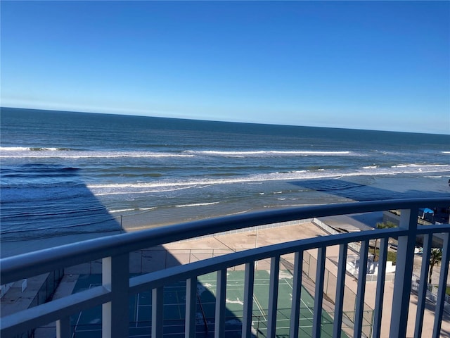 view of water feature with a beach view