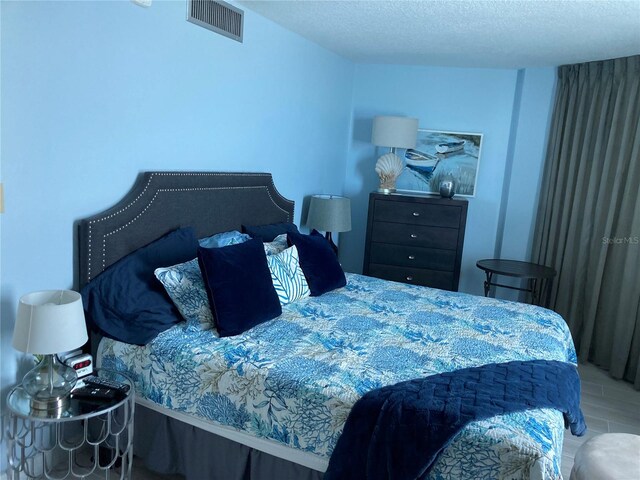 bedroom with a textured ceiling