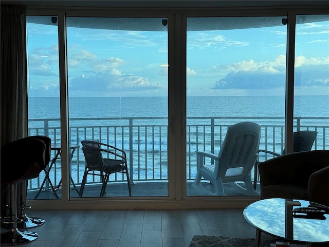 balcony featuring a water view