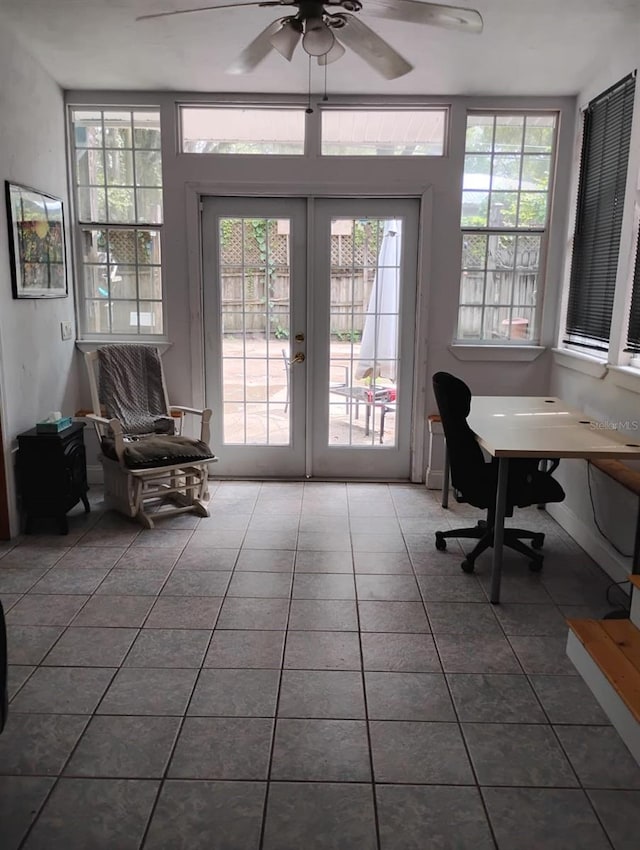 home office featuring tile patterned floors, ceiling fan, and french doors