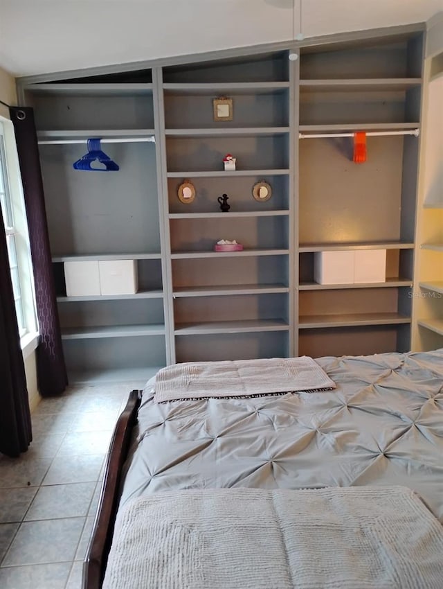 unfurnished bedroom featuring tile patterned floors