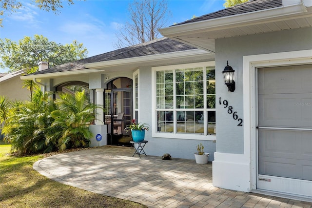 entrance to property featuring a garage