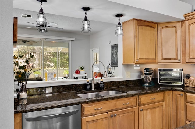 kitchen with stainless steel dishwasher, ceiling fan, sink, and hanging light fixtures