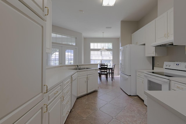 kitchen featuring sink, white cabinets, pendant lighting, white appliances, and light tile patterned flooring