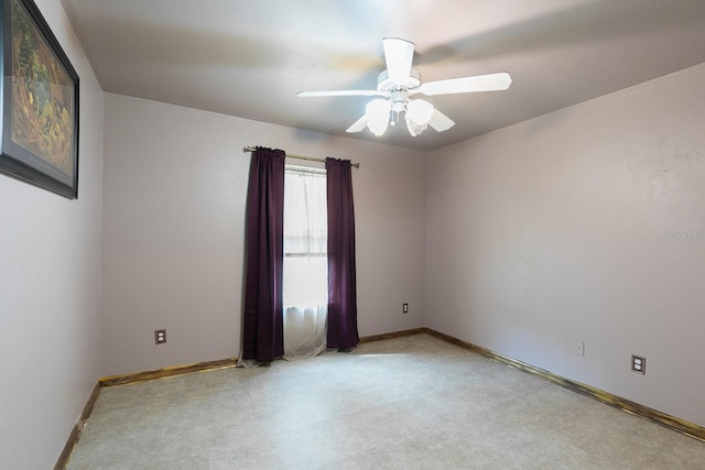 empty room featuring ceiling fan