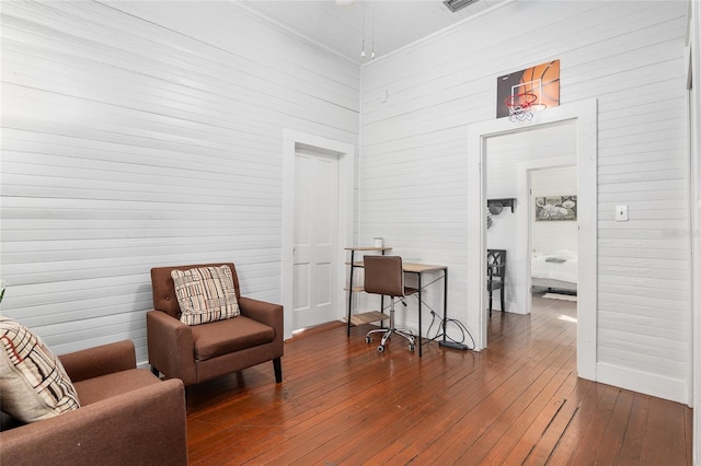 living area with dark hardwood / wood-style flooring