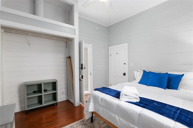 bedroom featuring dark hardwood / wood-style floors and ceiling fan