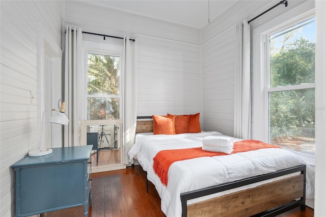 bedroom featuring dark wood-type flooring