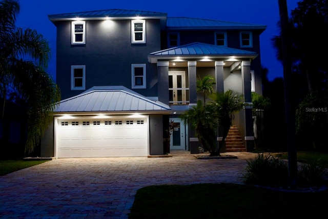 view of front of home featuring a garage