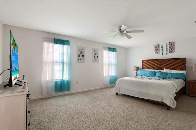 bedroom featuring carpet floors and ceiling fan