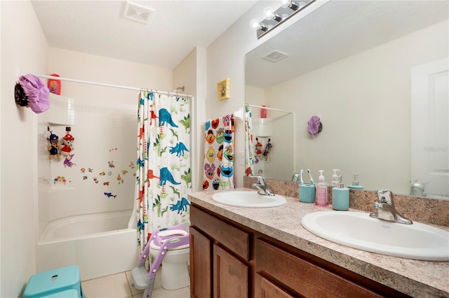 full bathroom featuring shower / tub combo with curtain, tile patterned flooring, vanity, and toilet