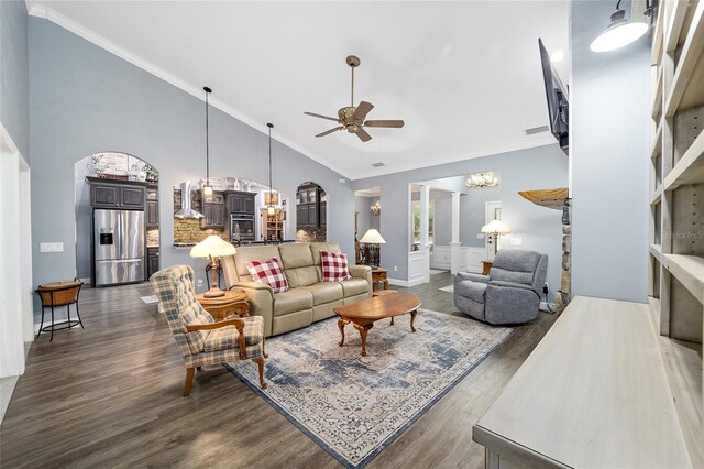 living room featuring ornamental molding, ceiling fan with notable chandelier, high vaulted ceiling, and dark hardwood / wood-style flooring