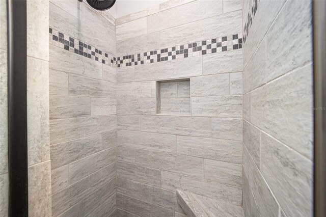 details with a tile shower