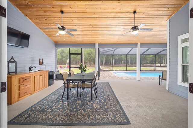 interior space with wooden ceiling, vaulted ceiling, sink, and ceiling fan