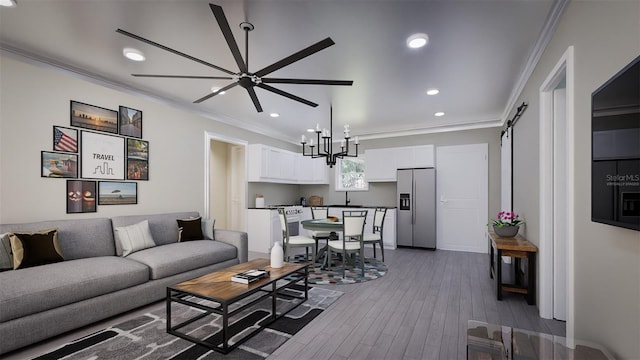 living room with ceiling fan with notable chandelier, crown molding, and dark hardwood / wood-style floors