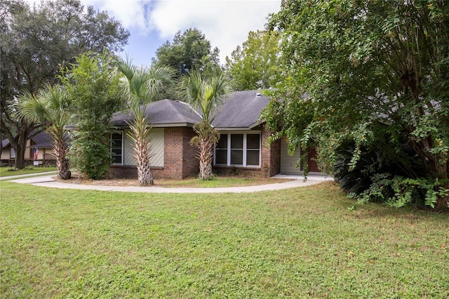 view of front facade with a front lawn