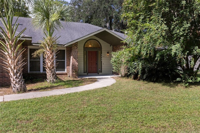 view of front of home with a front yard