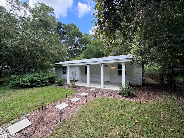 520 SE 5th St, Williston, FL 32696 - exterior space with a patio