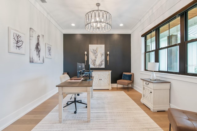 office space with light hardwood / wood-style flooring, a notable chandelier, and ornamental molding