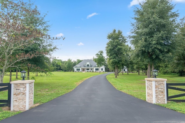 view of front of property with a front lawn