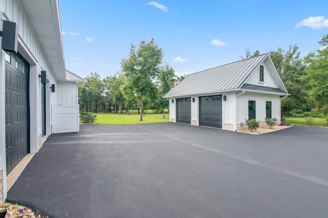 garage with a yard