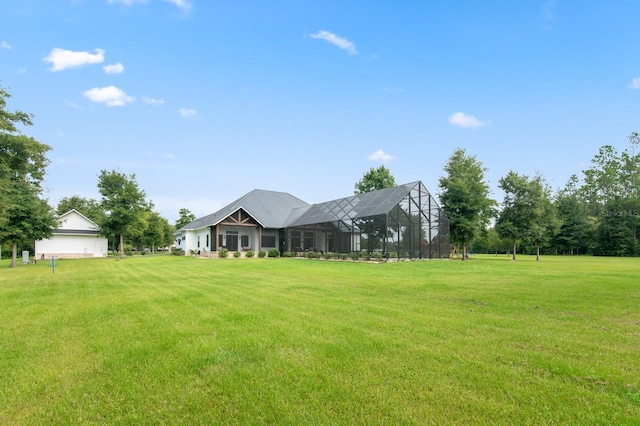 view of yard featuring glass enclosure