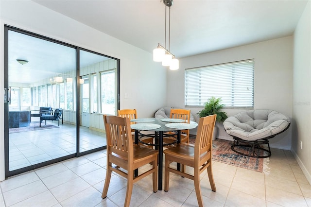 dining space with light tile patterned floors