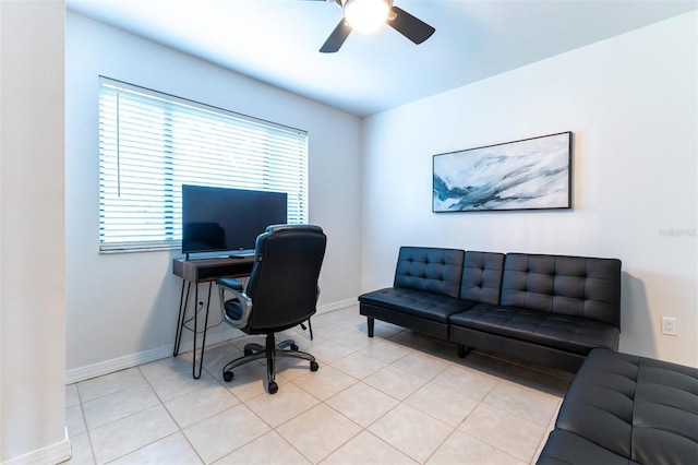 tiled office space with ceiling fan