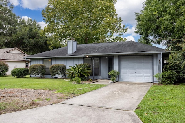 ranch-style house with a garage and a front lawn