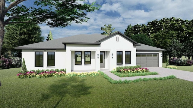 view of front of house featuring a garage and a front yard