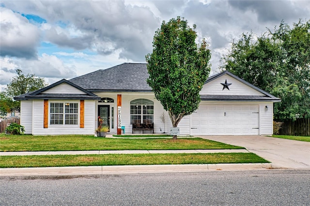 ranch-style home featuring a front lawn and a garage