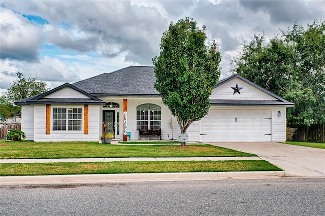 ranch-style home with a garage, a shingled roof, concrete driveway, fence, and a front yard