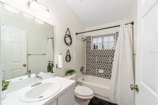 full bathroom featuring vanity, toilet, and shower / bath combination with curtain